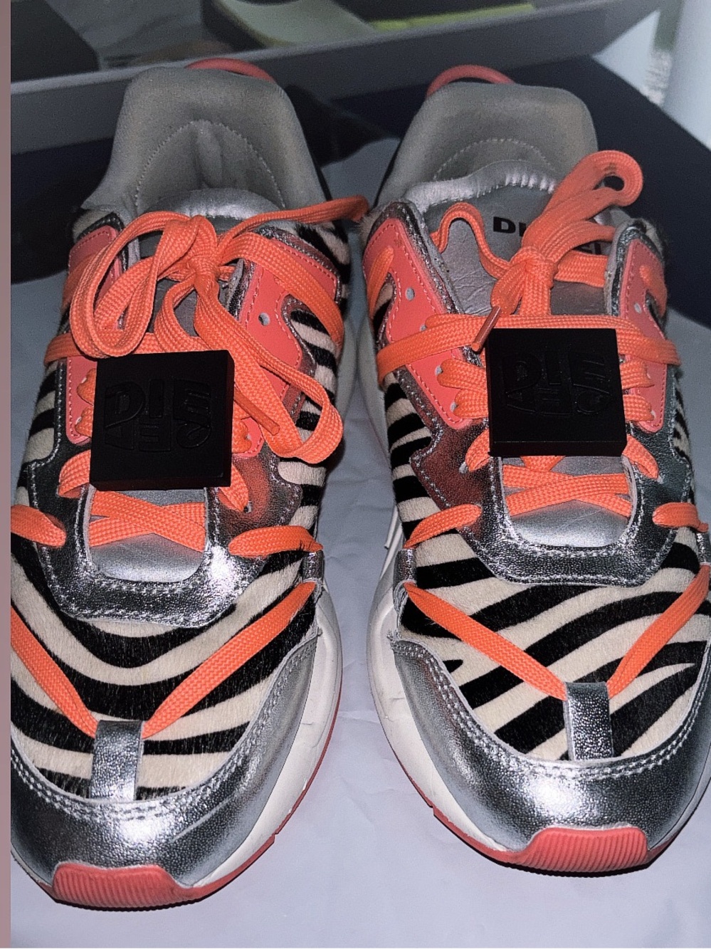 Metallic Silver Zebra Sneakers with Coral Accents